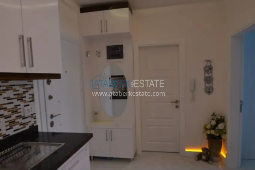 Приобрести Квартира в Махмутларе видовая, меблированная в комплексе премиум класса  9 