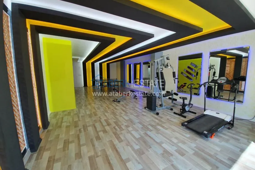 Квартира в Махмутларе с застекленным балконом и мебелью 12 