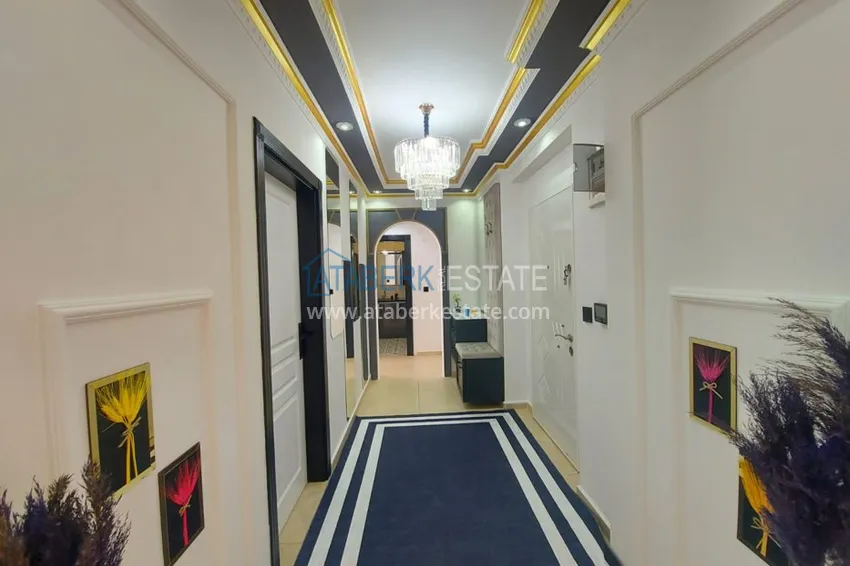 Приобрести Квартира в Махмутларе с мебелью в комплексе на центральной улице 1 