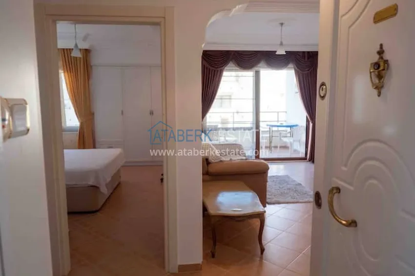 Приобрести Квартира двухкомнатная с мебелью в жилом комплексе в Махмутларе 1 