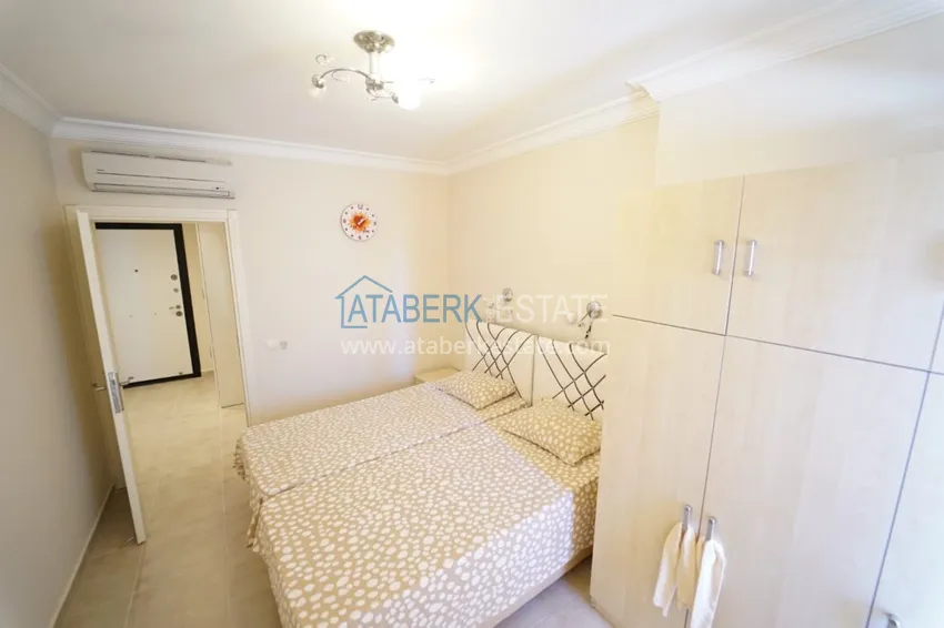 Приобрести Квартира в Махмутларе двухкомнатная с мебелью в комплексе рядом с морем 10 