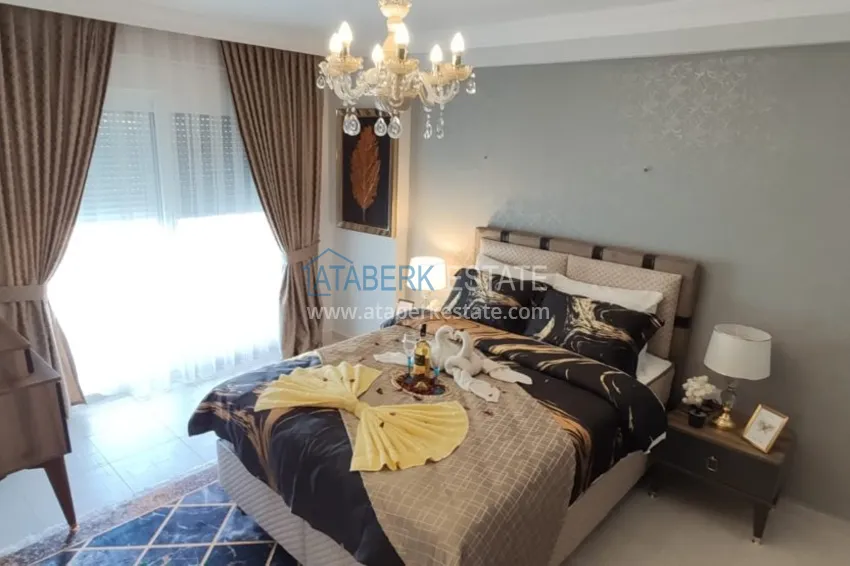 Приобрести Квартира в Махмутларе трехкомнатная с современным интерьером  10 