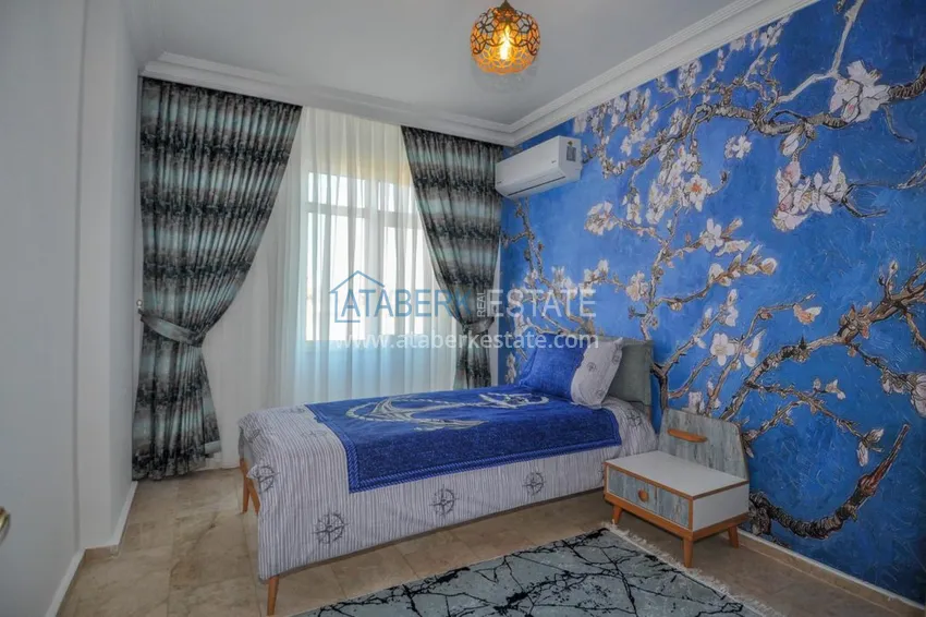 Приобрести Большая квартира в Махмутларе с мебелью, частичным видом на море  11 