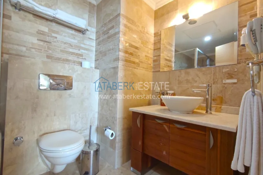 Приобрести Квартира в Махмутларе с мебелью в элитном жилом комплексе отельного типа 11 