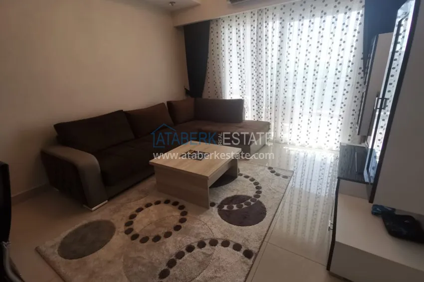 Приобрести Аренда квартиры в Алании, Махмутлар в престижном комплексе с частным пляжем А156  12 