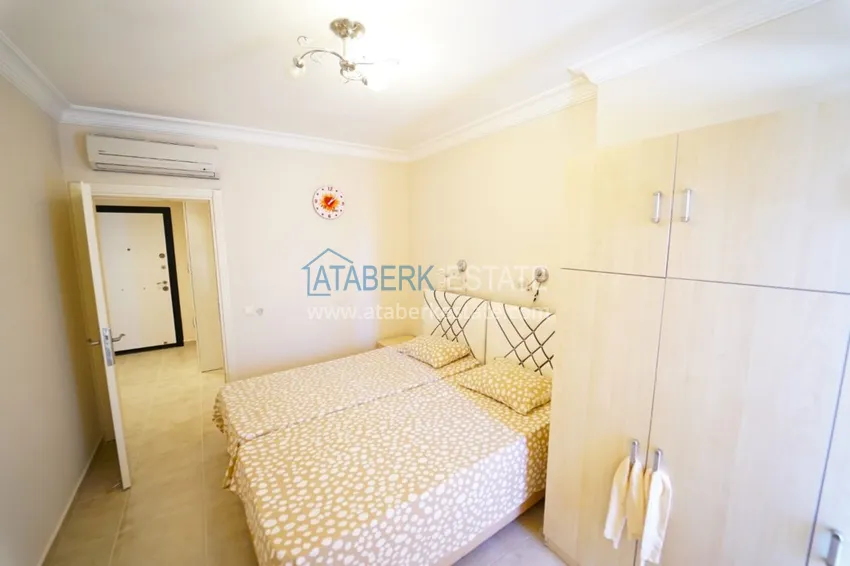 Приобрести Квартира в Махмутларе двухкомнатная с мебелью в комплексе рядом с морем 11 