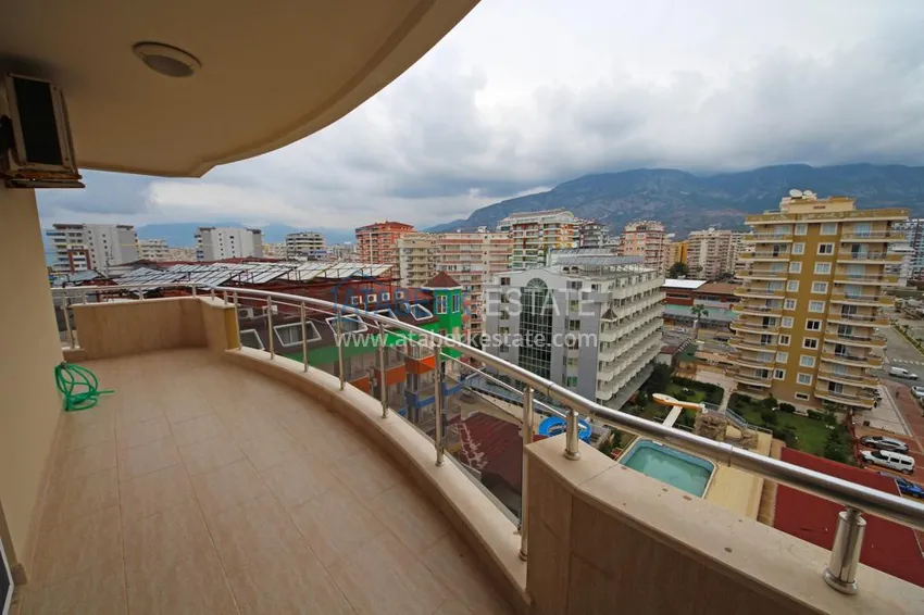 Приобрести Квартира в Махмутларе на первой береговой в комплексе с большой ухоженной территорией  13 