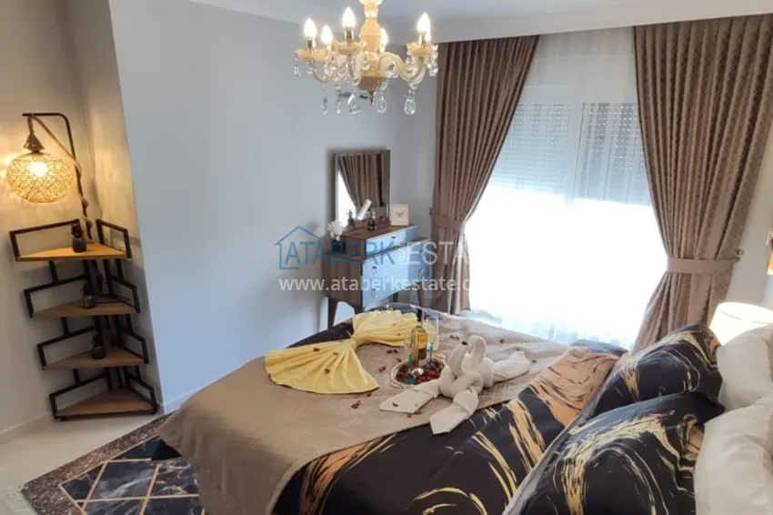 Приобрести Квартира в Махмутларе трехкомнатная с современным интерьером  11 