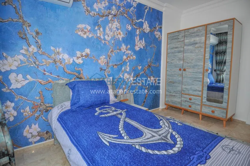 Приобрести Большая квартира в Махмутларе с мебелью, частичным видом на море  12 