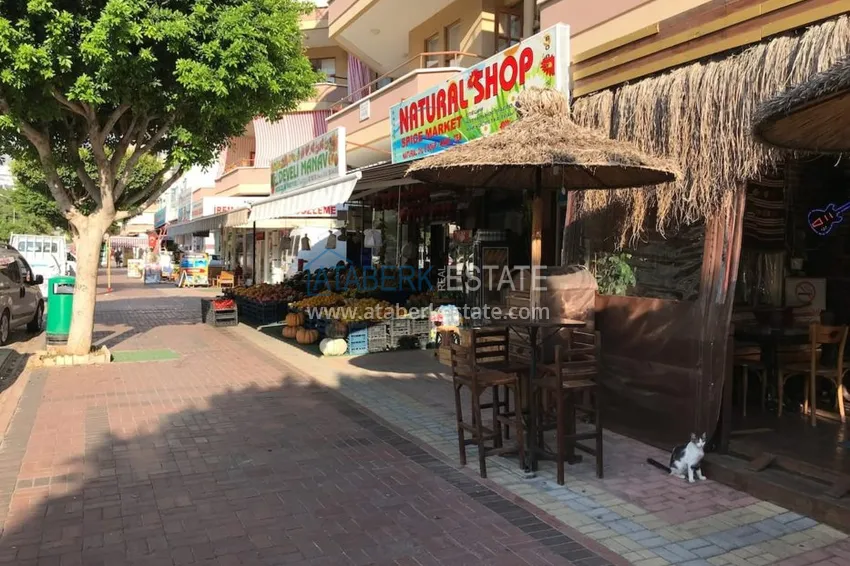 Квартира двухкомнатная с мебелью в жилом комплексе в Махмутларе 11 