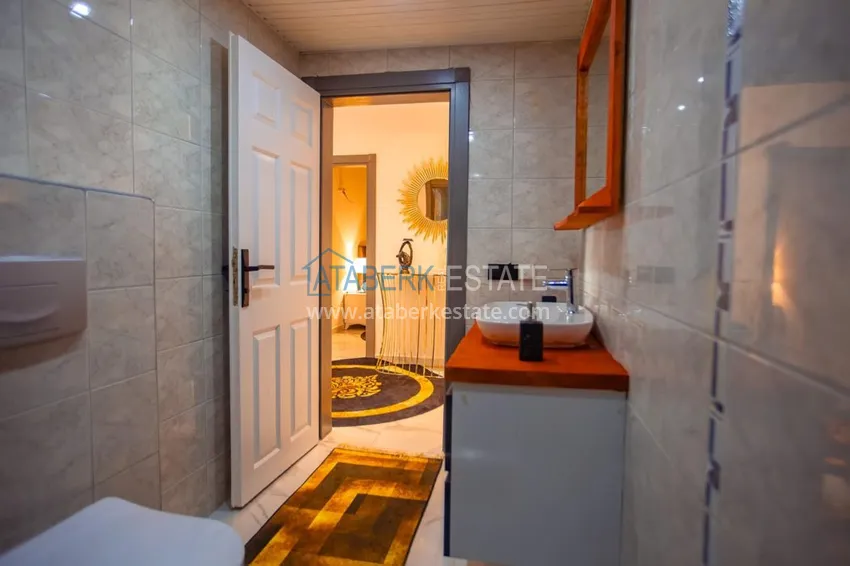 Приобрести Квартира в Махмутларе трехкомнатная, меблированная с видом на горы 13 