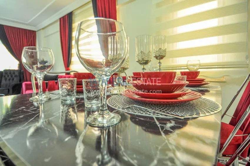 Приобрести Квартира в Махмутларе с мебелью, застекленным балконом  14 