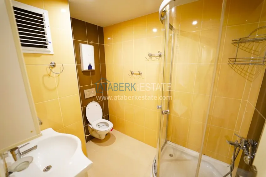 Приобрести Квартира в Махмутларе двухкомнатная с мебелью в комплексе рядом с морем 12 