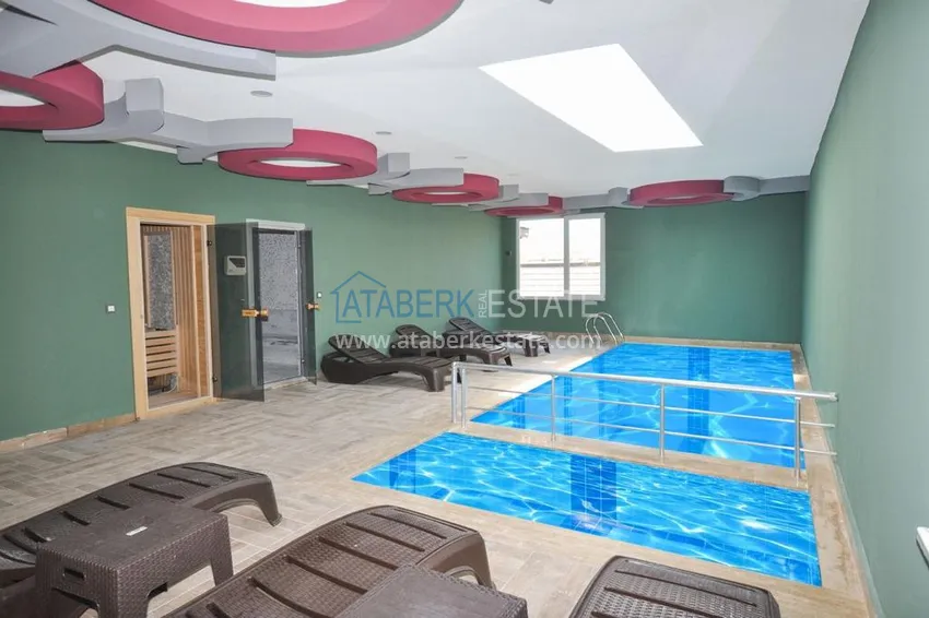 Квартира в Махмутларе двухкомнатная с чистовой отделкой в молодом комплексе  12 