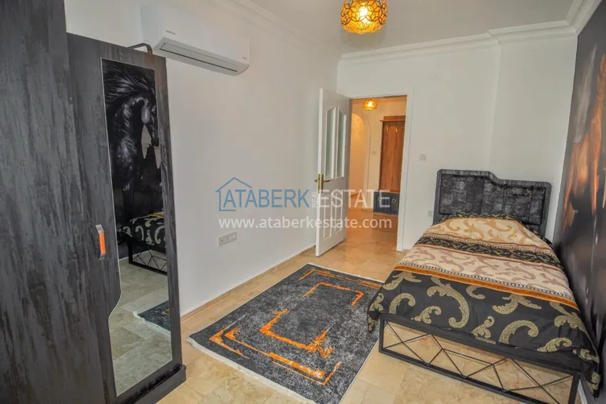 Приобрести Большая квартира в Махмутларе с мебелью, частичным видом на море  13 