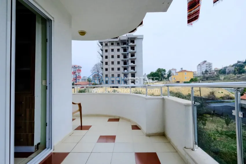 Приобрести Квартира в Авсалларе трехкомнатная с мебелью, отдельной кухней и видом на горы 13 