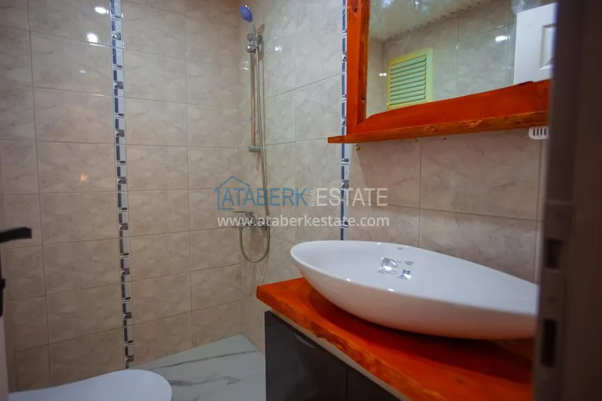 Приобрести Квартира в Махмутларе трехкомнатная, меблированная с видом на горы 14 