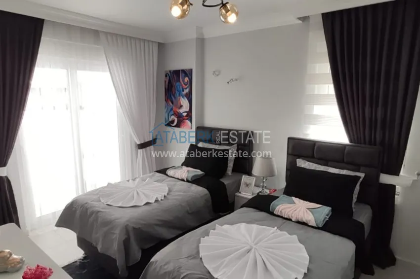 Приобрести Квартира в Махмутларе трехкомнатная с современным интерьером  14 