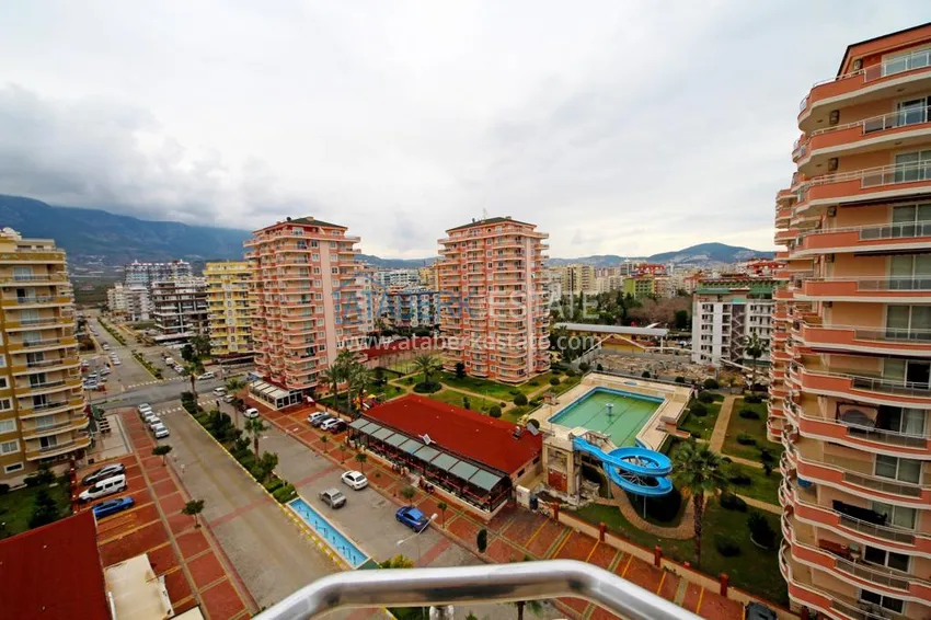 Приобрести Квартира в Махмутларе на первой береговой в комплексе с большой ухоженной территорией  15 