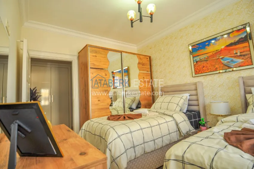 Приобрести Квартира в Махмутларе – трехкомнатная с современным интерьером и видом на море 13 