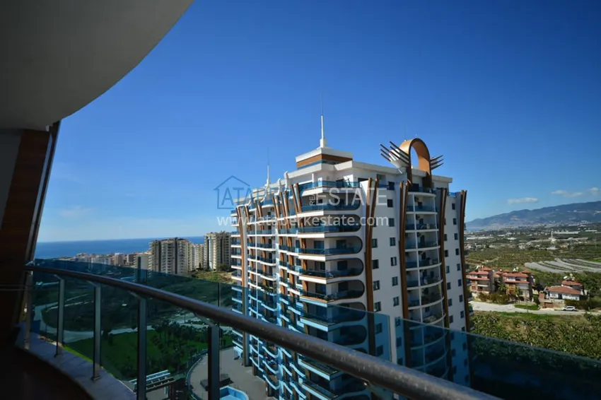Приобрести Квартира в Махмутларе с мебелью и бытовой техникой, в престижном комплексе 16 