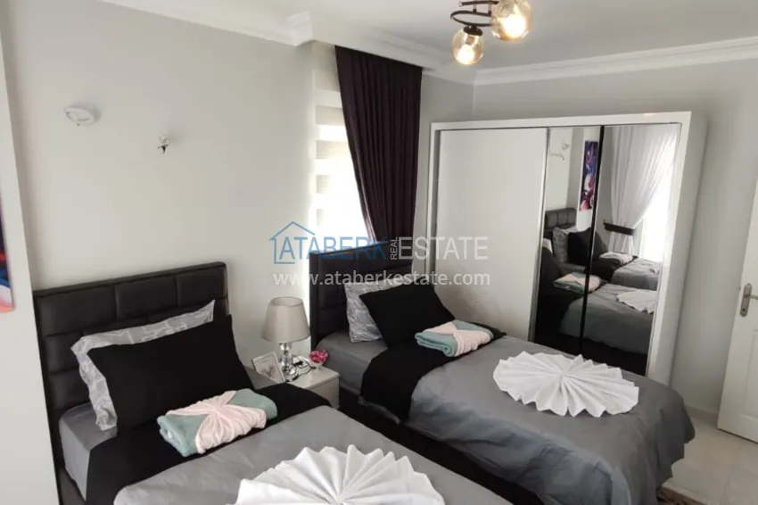 Приобрести Квартира в Махмутларе трехкомнатная с современным интерьером  15 