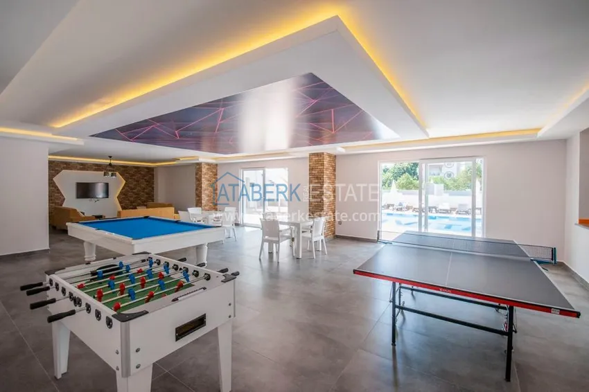 Квартира в Махмутларе двухкомнатная с чистовой отделкой в молодом комплексе  14 