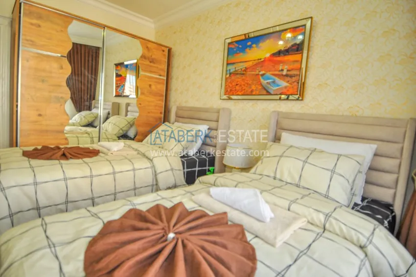 Приобрести Квартира в Махмутларе – трехкомнатная с современным интерьером и видом на море 14 