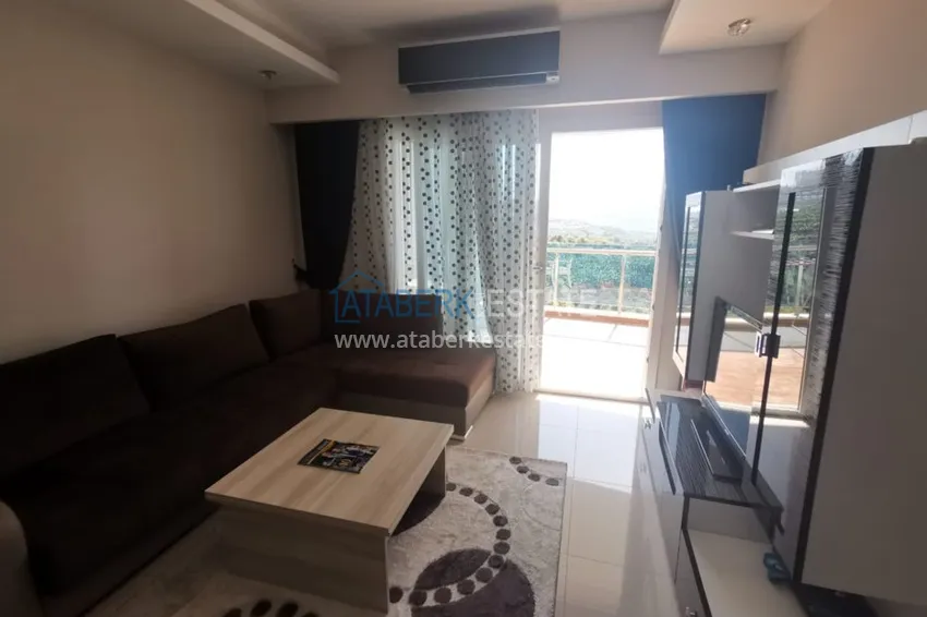 Приобрести Аренда квартиры в Алании, Махмутлар в престижном комплексе с частным пляжем А156  15 