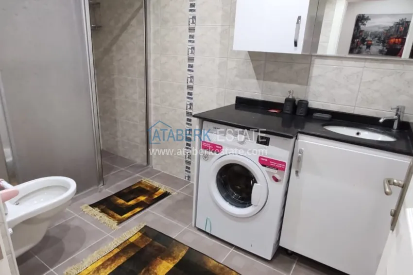 Приобрести Квартира в Махмутларе трехкомнатная с современным интерьером  16 