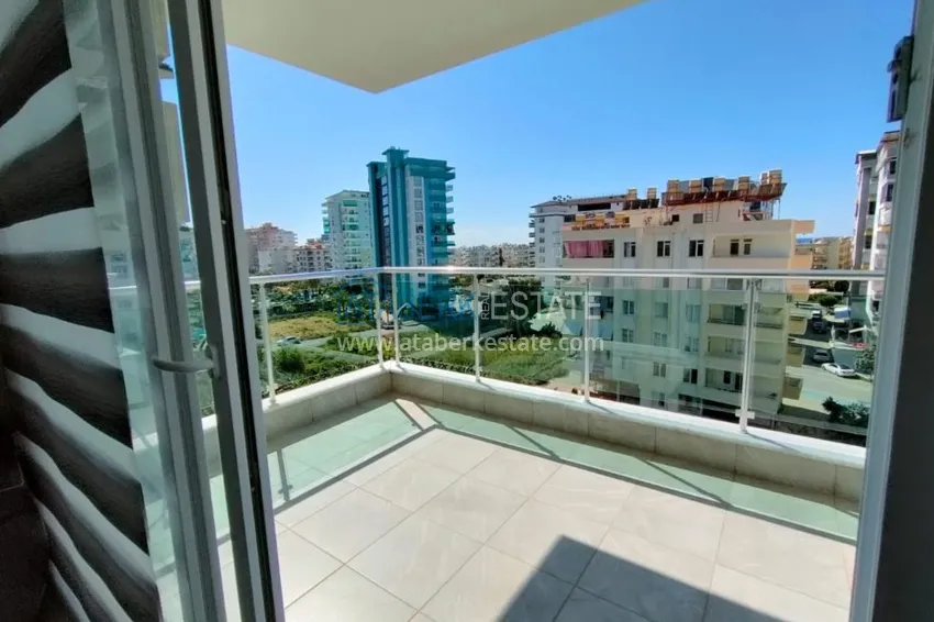 Приобрести Аренда квартиры в Махмутларе – двухкомнатная в 200 метрах от моря  15 