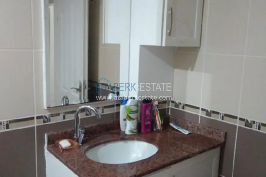 Приобрести Квартира в Махмутларе, двухкомнатная с мебелью в жилом комплексе 18 