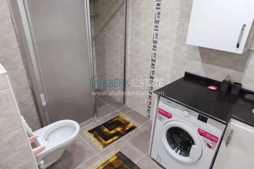 Приобрести Квартира в Махмутларе трехкомнатная с современным интерьером  17 