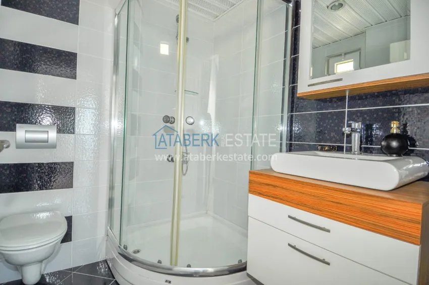 Приобрести Квартира в Махмутларе – трехкомнатная с современным интерьером и видом на море 16 