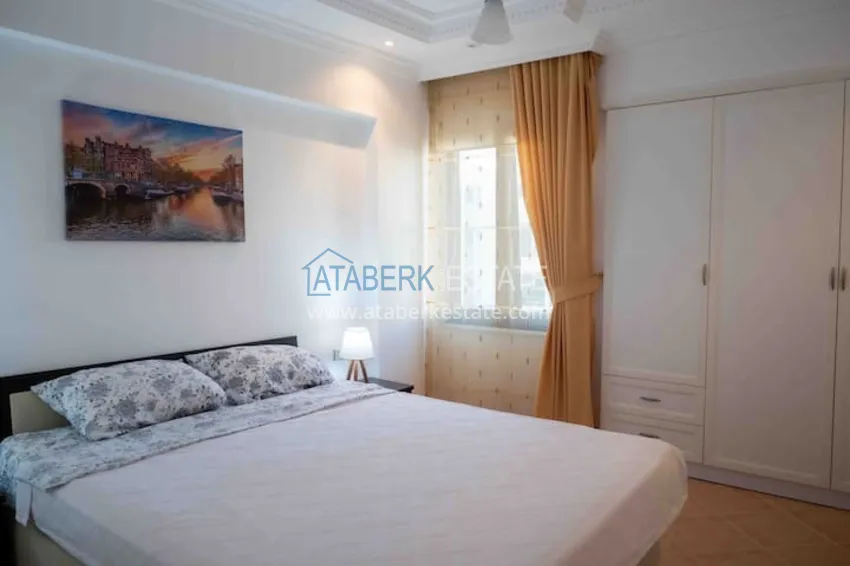 Приобрести Квартира двухкомнатная с мебелью в жилом комплексе в Махмутларе 17 