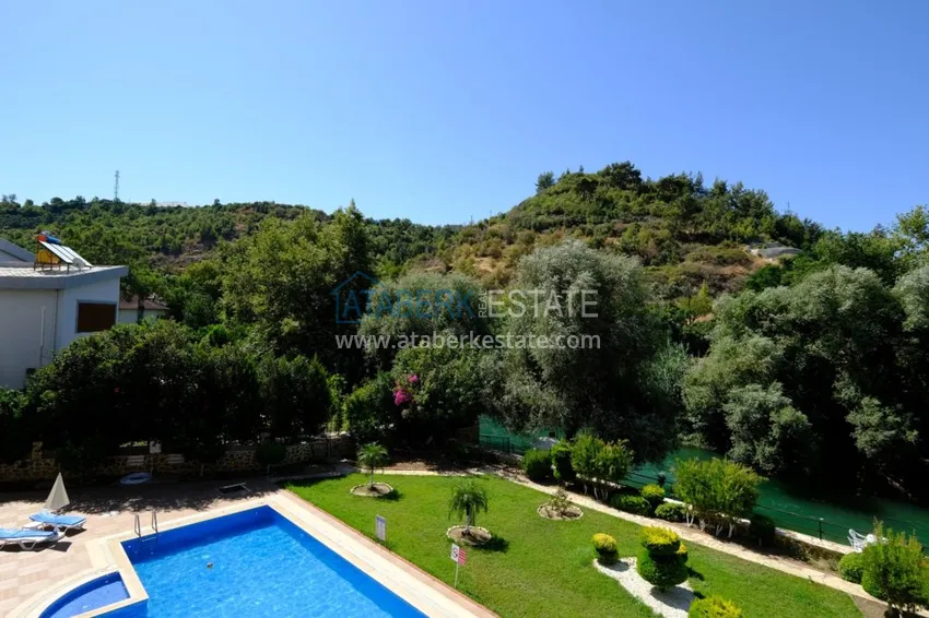 Приобрести Квартира в районе Кестель в комплексе на берегу горной реки 17 