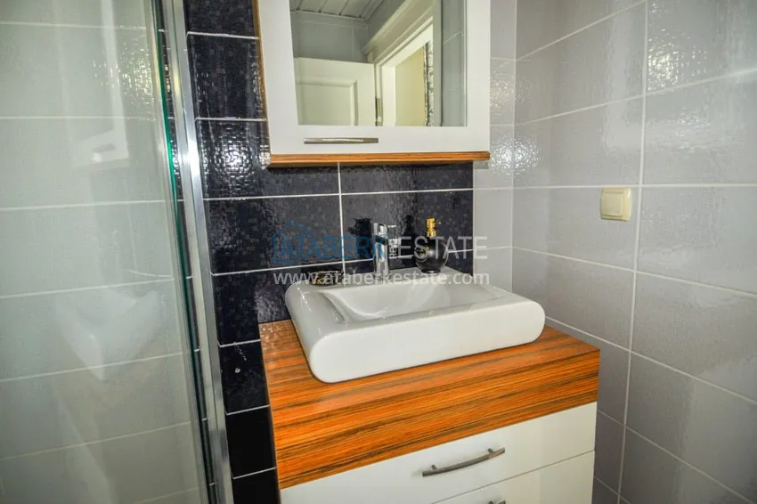 Приобрести Квартира в Махмутларе – трехкомнатная с современным интерьером и видом на море 17 