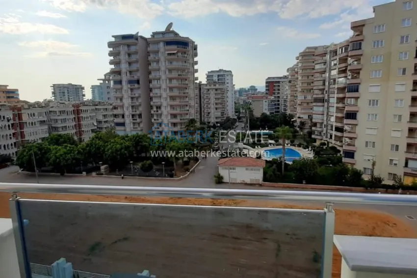 Приобрести Квартира в Махмутларе с чистовой отделкой, 2 спальни, отдельная кухня  18 