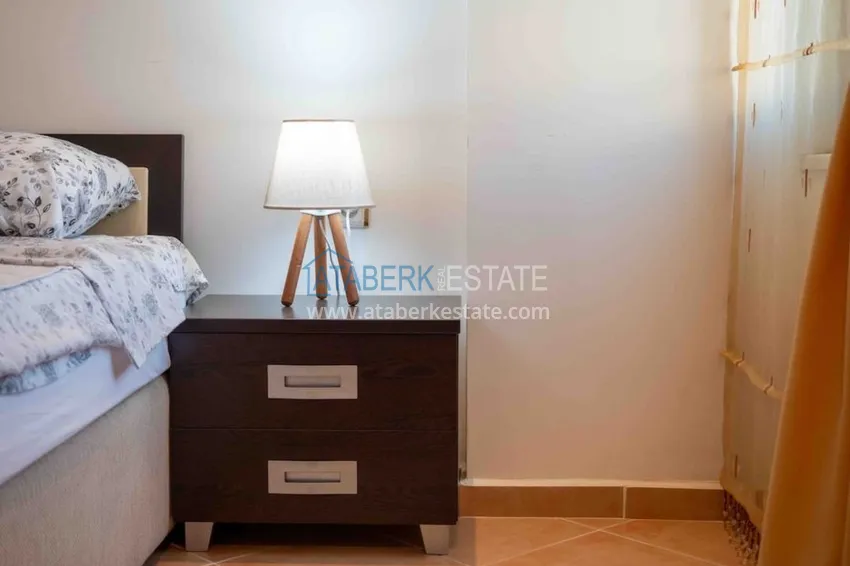 Приобрести Квартира двухкомнатная с мебелью в жилом комплексе в Махмутларе 19 