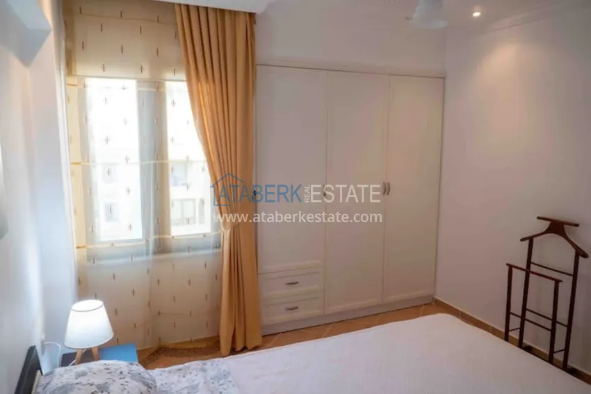 Приобрести Квартира двухкомнатная с мебелью в жилом комплексе в Махмутларе 20 