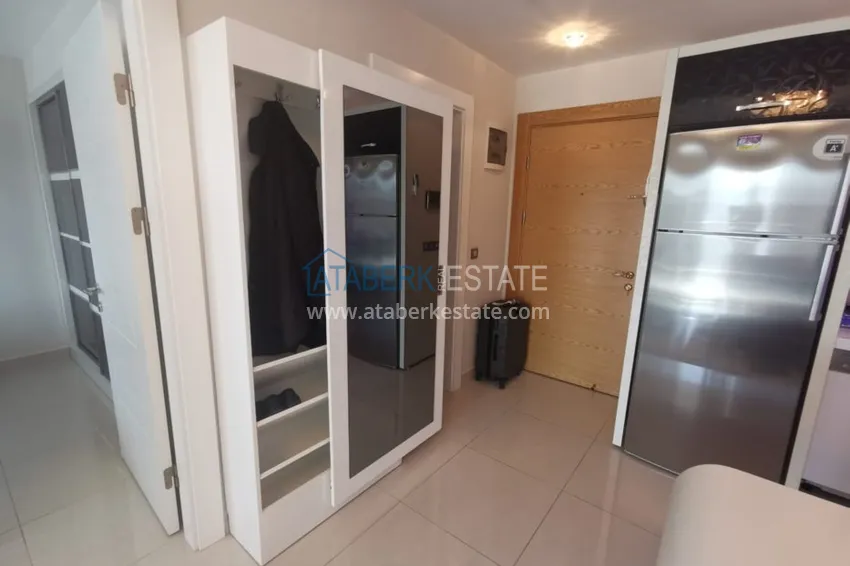 Приобрести Аренда квартиры в Алании, Махмутлар в престижном комплексе с частным пляжем А156  1 