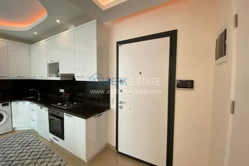 Приобрести Квартира в Махмутларе с мебелью в комплексе европейского типа 1 