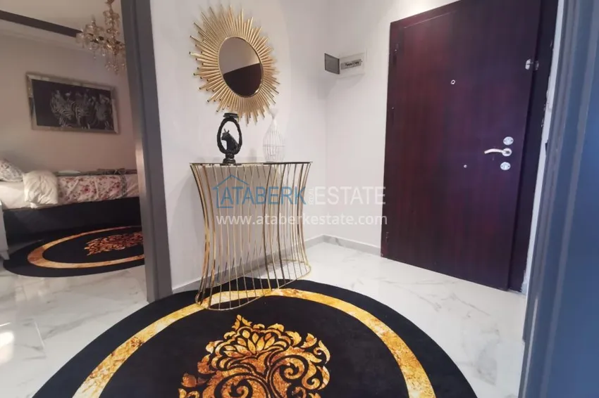 Приобрести Квартира в Махмутларе трехкомнатная, меблированная с видом на горы 1 