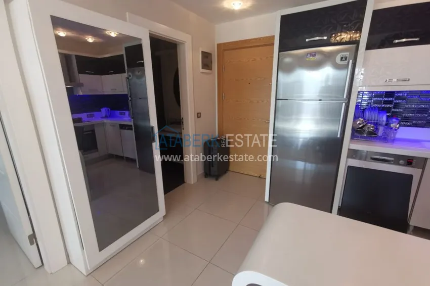 Приобрести Аренда квартиры в Алании, Махмутлар в престижном комплексе с частным пляжем А156  2 