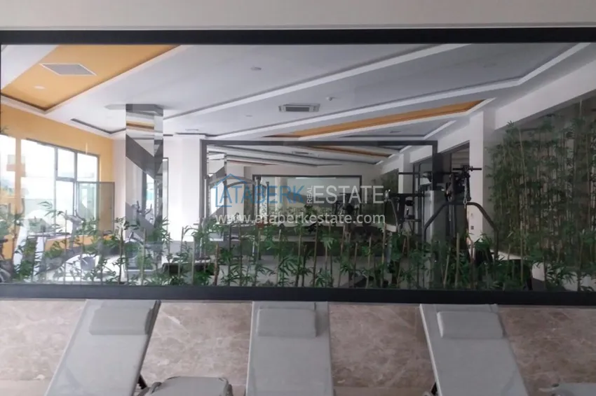 Квартира в районе Джикджилли меблированная с видом на море в комплексе класса люкс 21 