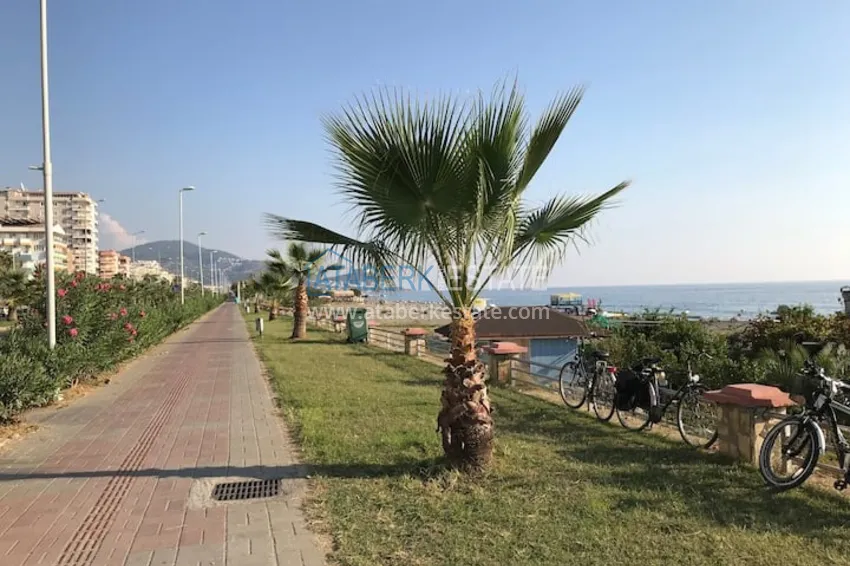 Квартира двухкомнатная с мебелью в жилом комплексе в Махмутларе 21 