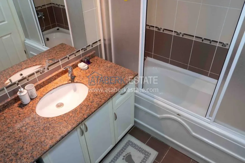 Приобрести Квартира двухкомнатная с мебелью в жилом комплексе в Махмутларе 24 