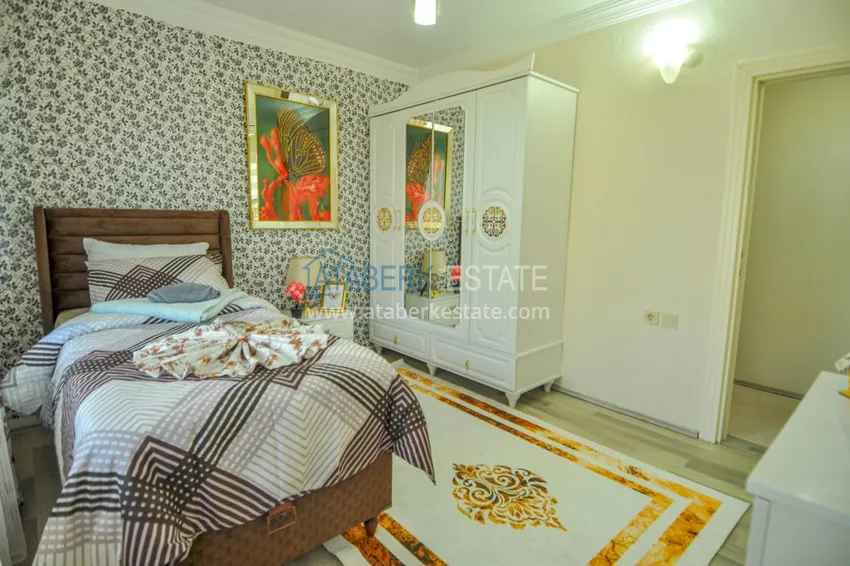 Приобрести Квартира в Махмутларе с мебелью, застекленным балконом  25 