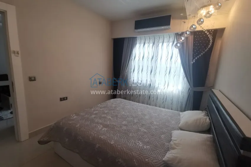 Приобрести Аренда квартиры в Алании, Махмутлар в престижном комплексе с частным пляжем А156  25 