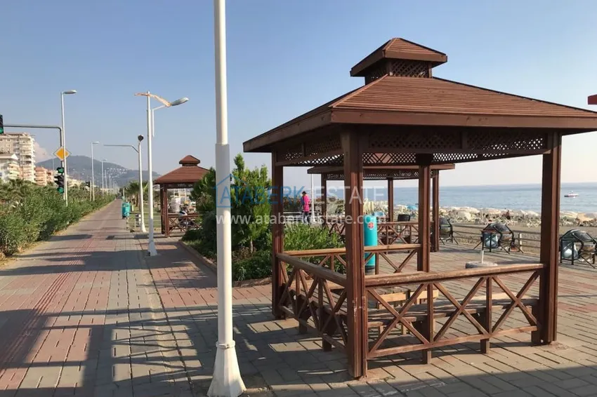 Квартира двухкомнатная с мебелью в жилом комплексе в Махмутларе 23 